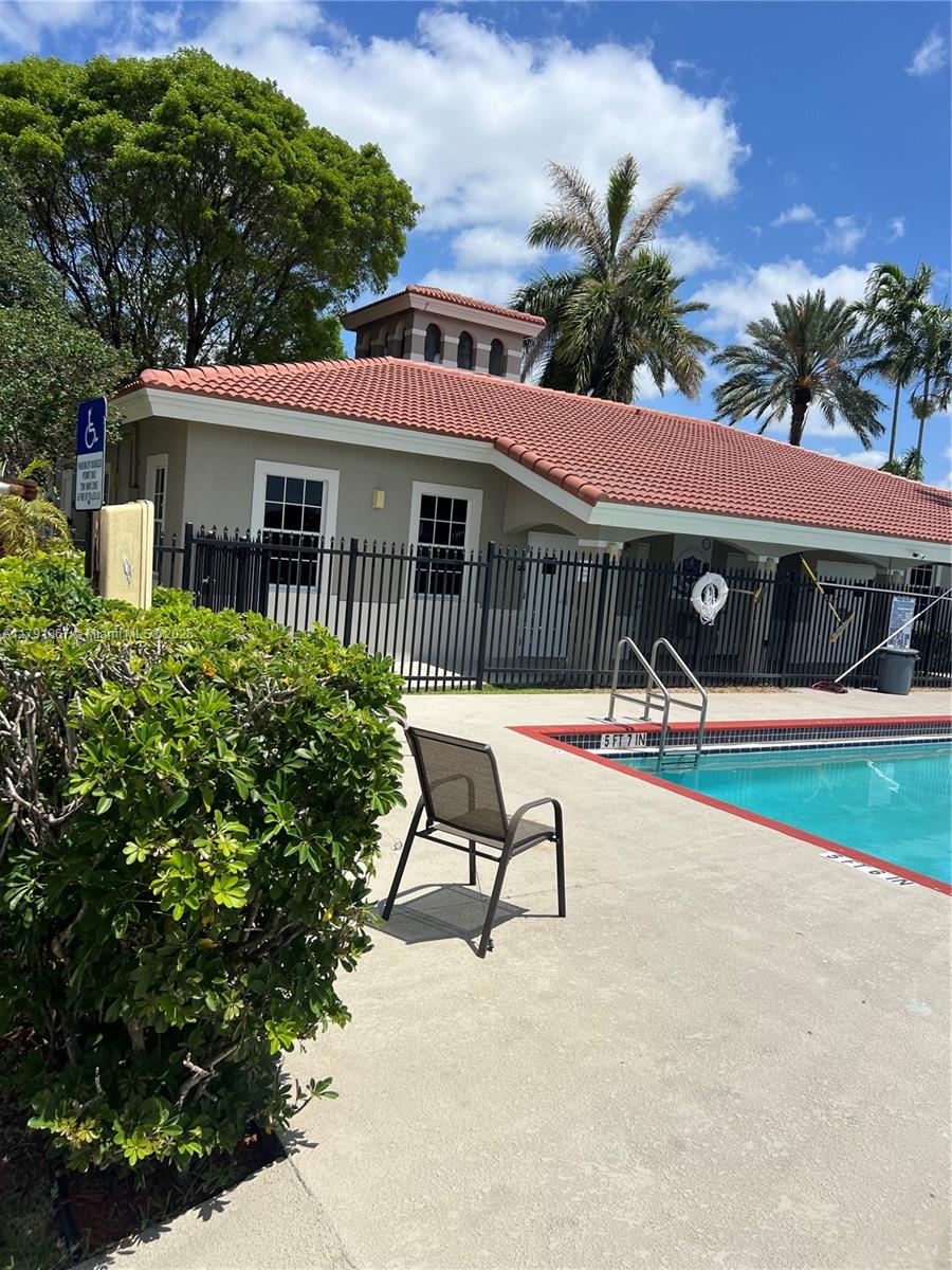5357 Southwest 125th Avenue Miramar, FL 33027 - Photo 33 of 39 a view of a house with backyard and sitting area