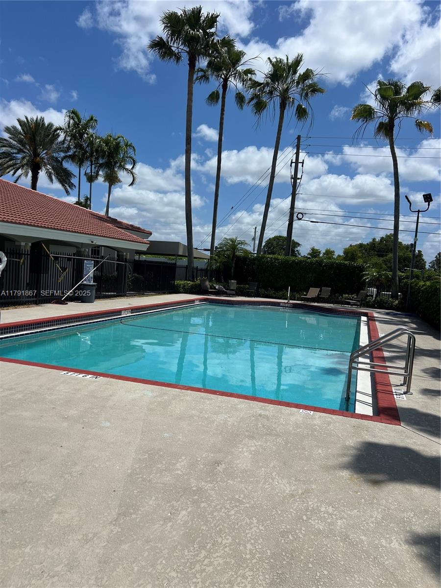 5357 Southwest 125th Avenue Miramar, FL 33027 - Photo 35 of 39 a view of a yard with a slide