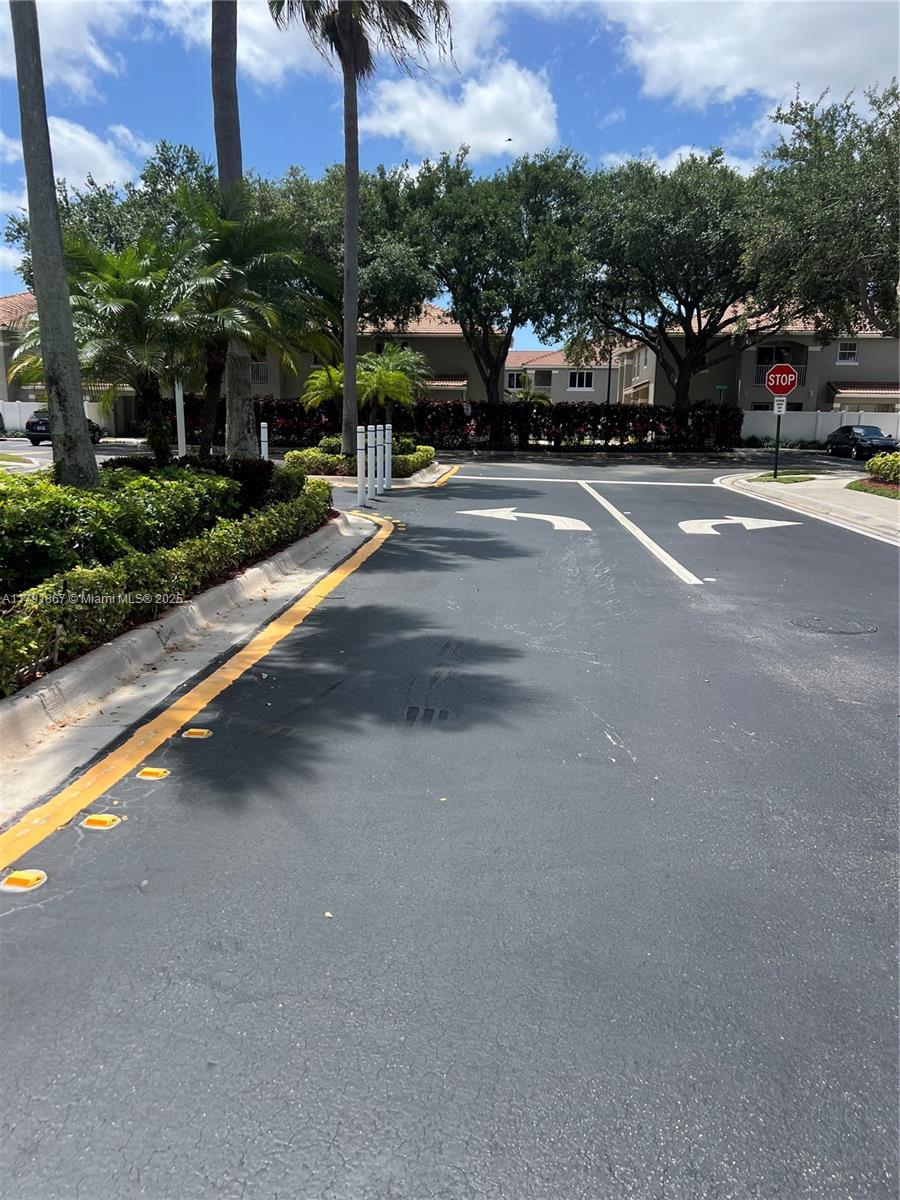 5357 Southwest 125th Avenue Miramar, FL 33027 - Photo 38 of 39 a view of a city street with a road