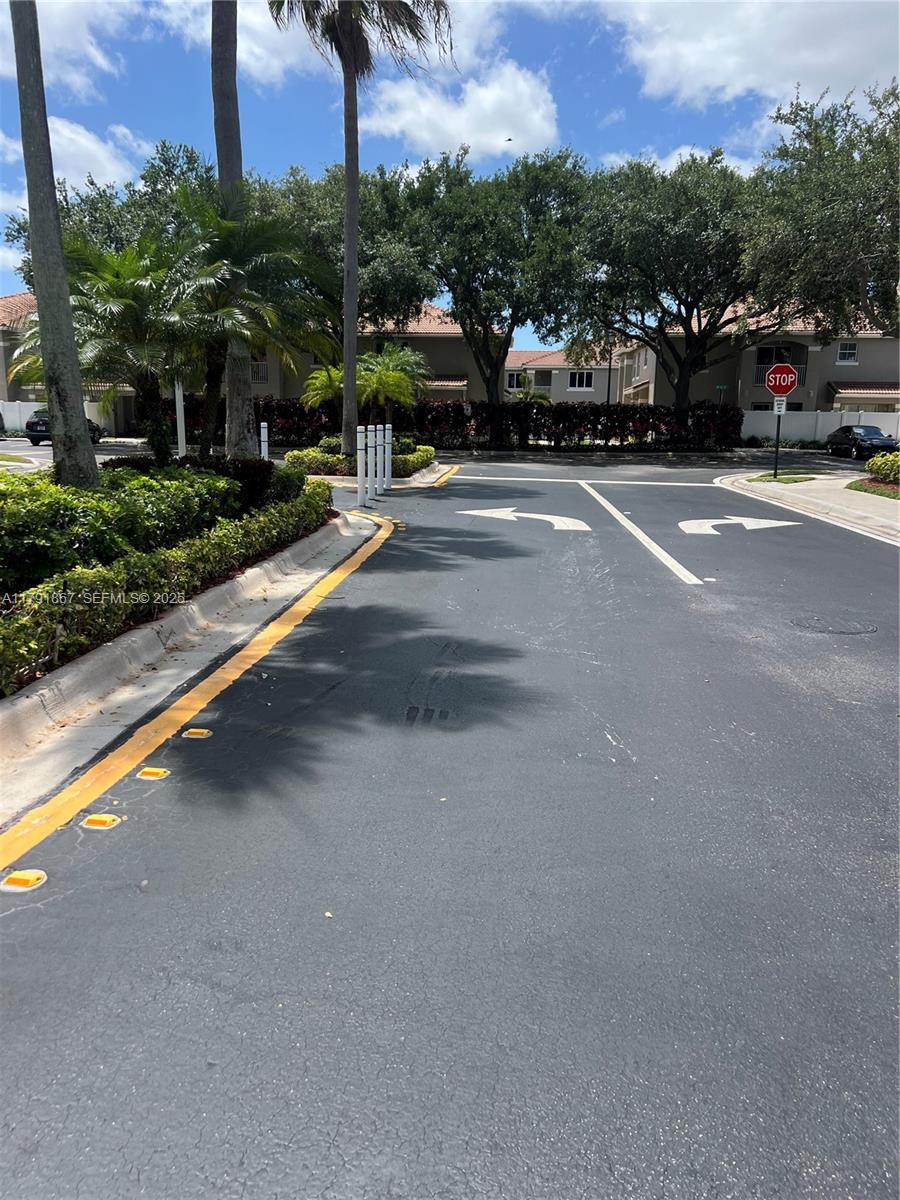 5357 Southwest 125th Avenue Miramar, FL 33027 - Photo 38 of 39 a view of a city street with a road