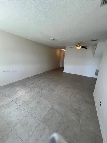 a view of a room with an empty space