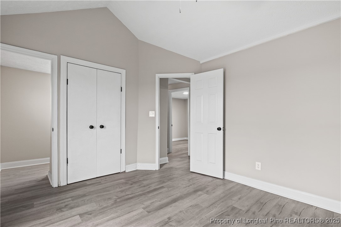 2302 Odom Road Hope Mills, NC 28348 - Photo 12 of 33 a view of an empty room and wooden floor