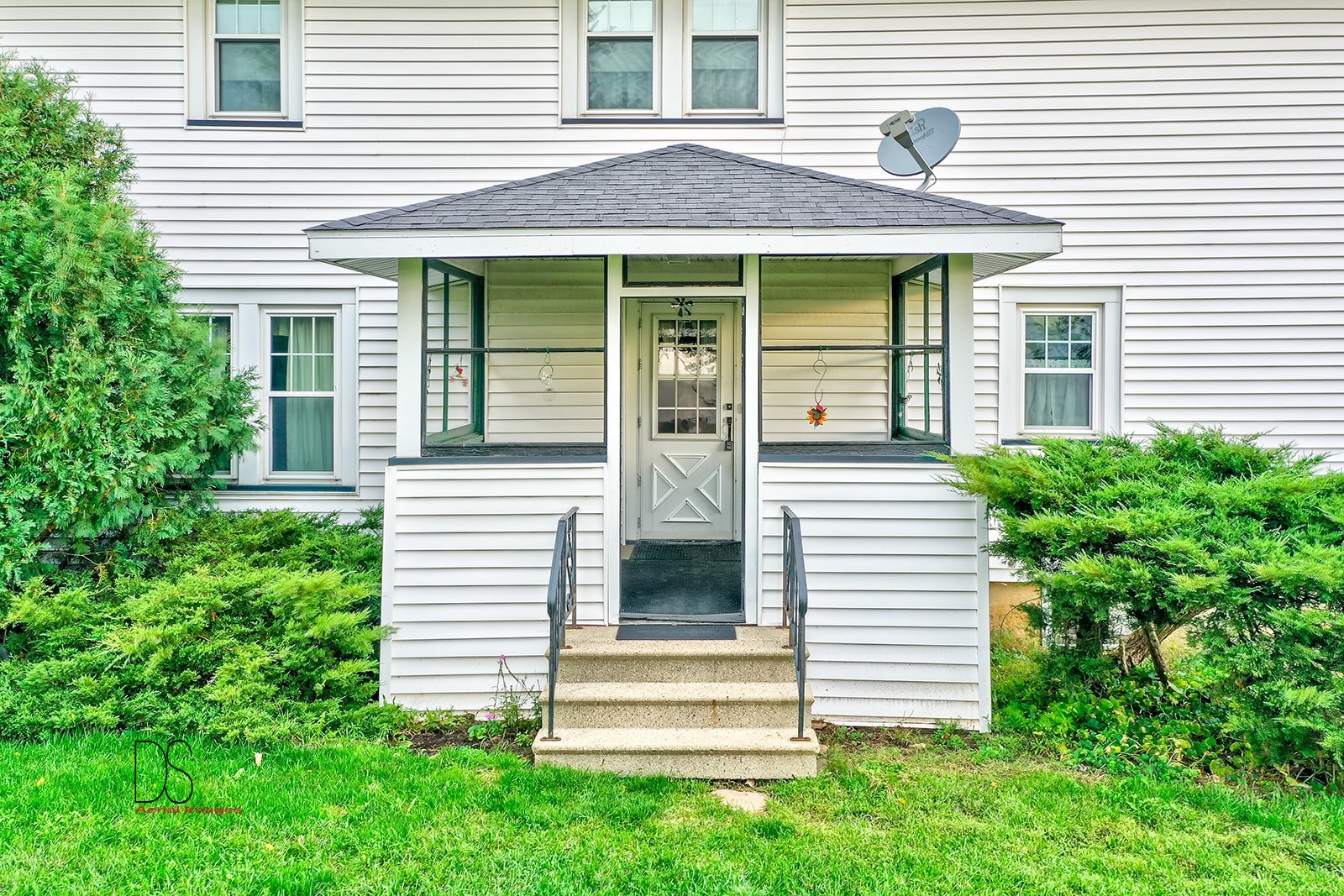 1006 North 2401st Road Ottawa, IL 61350 - Photo 21 of 35 a front view of a house with a porch