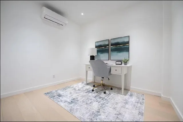 a bathroom with a sink toilet and mirror