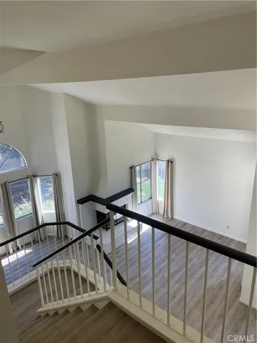 a view of staircase with lots of white walls