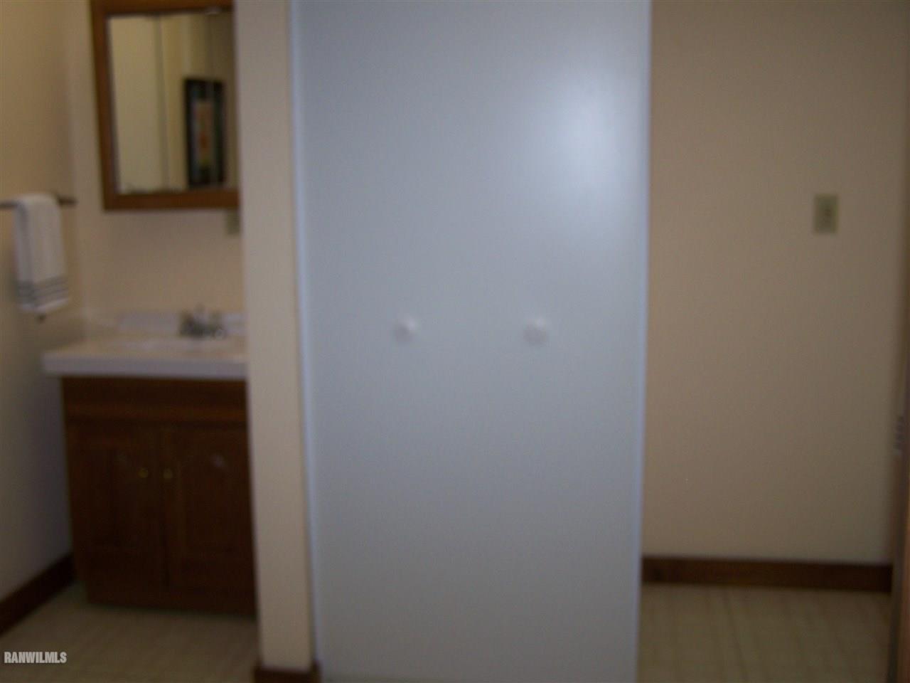 9833 Becker Road Savanna, IL 61074 - Photo 21 of 25 a bathroom with a sink