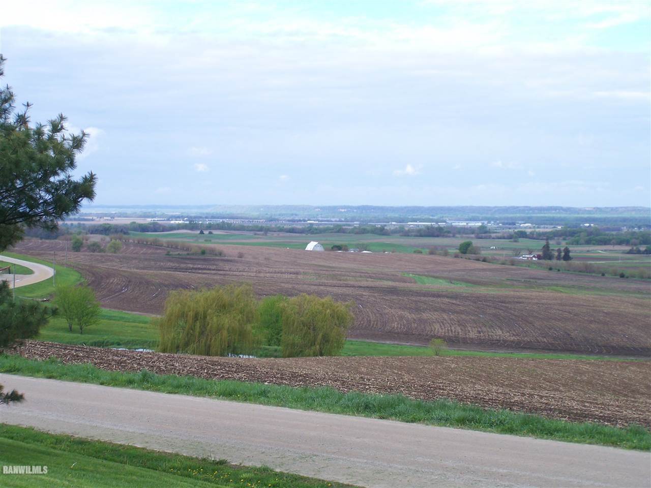 9833 Becker Road Savanna, IL 61074 - Photo 24 of 25 an aerial view of a yard with mountain view