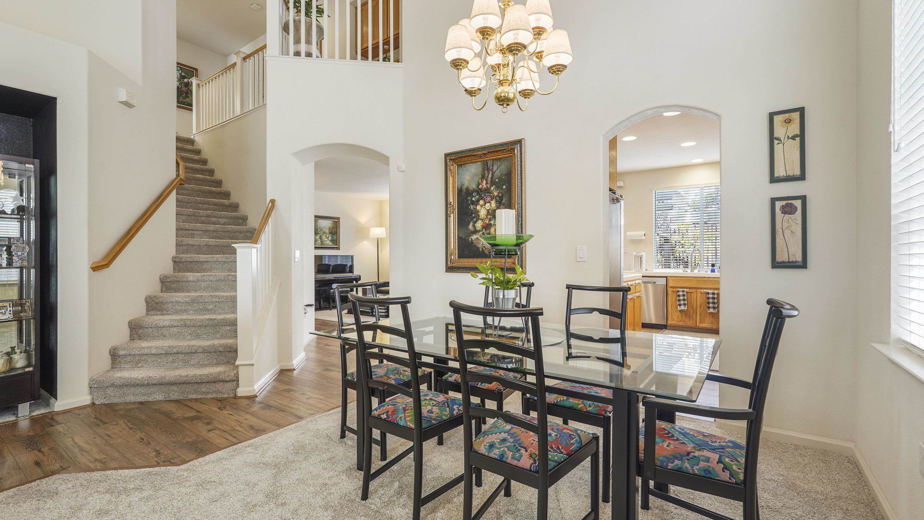 1388 Four Oaks Road San Jose, CA 95131 - Photo 11 of 47 a view of a dining room with furniture and a chandelier