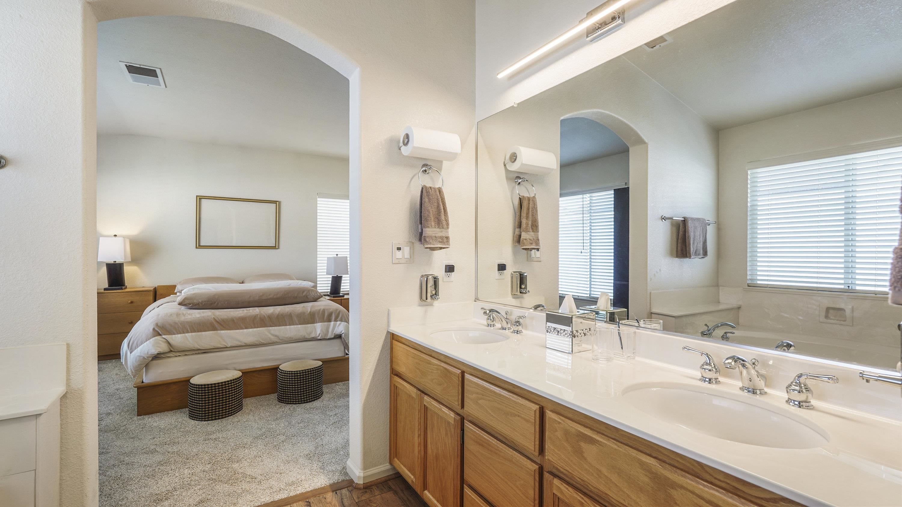 1388 Four Oaks Road San Jose, CA 95131 - Photo 23 of 47 a bathroom with a double vanity sink and a