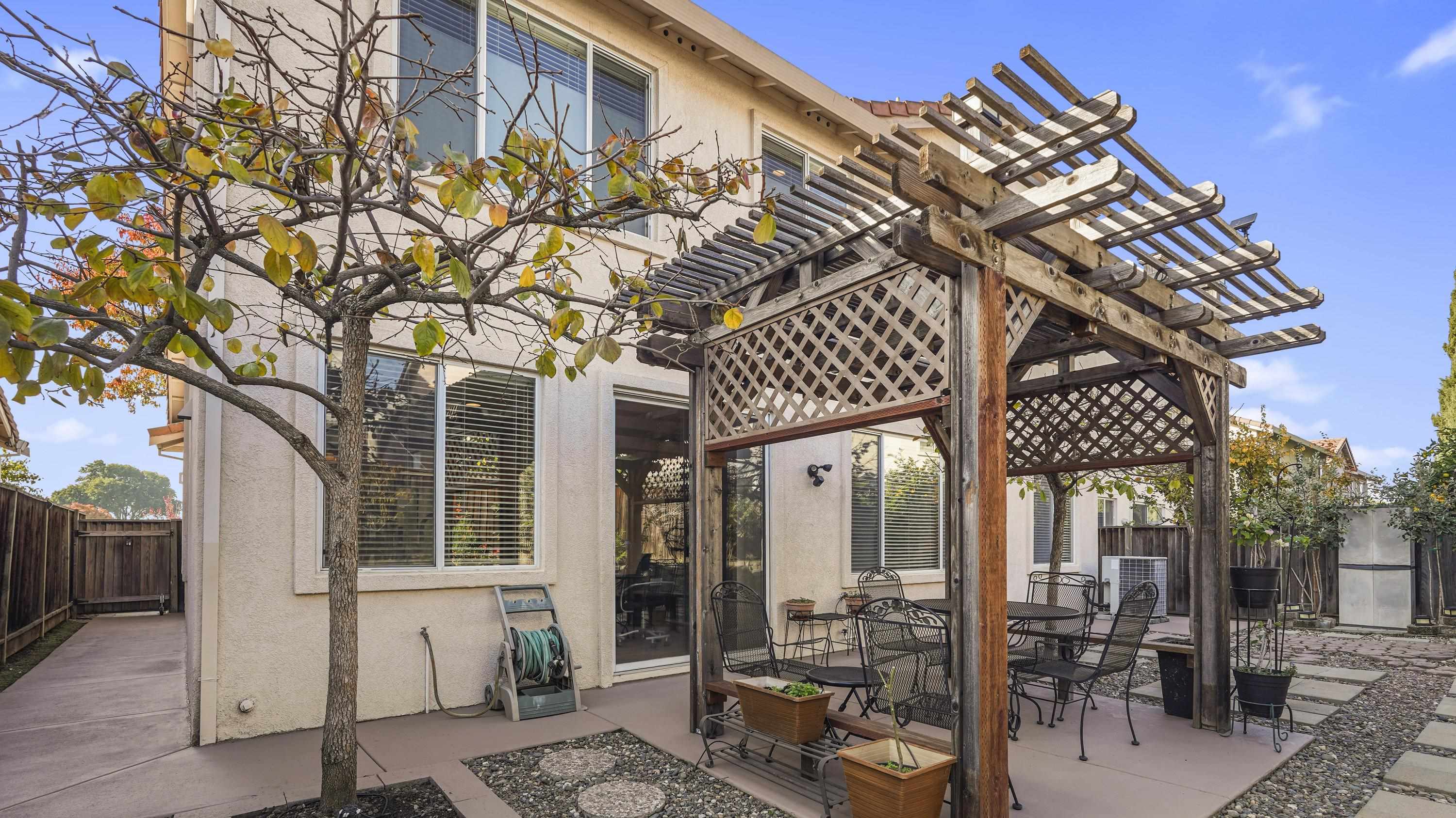 1388 Four Oaks Road San Jose, CA 95131 - Photo 40 of 47 a view of a chairs and table in the patio