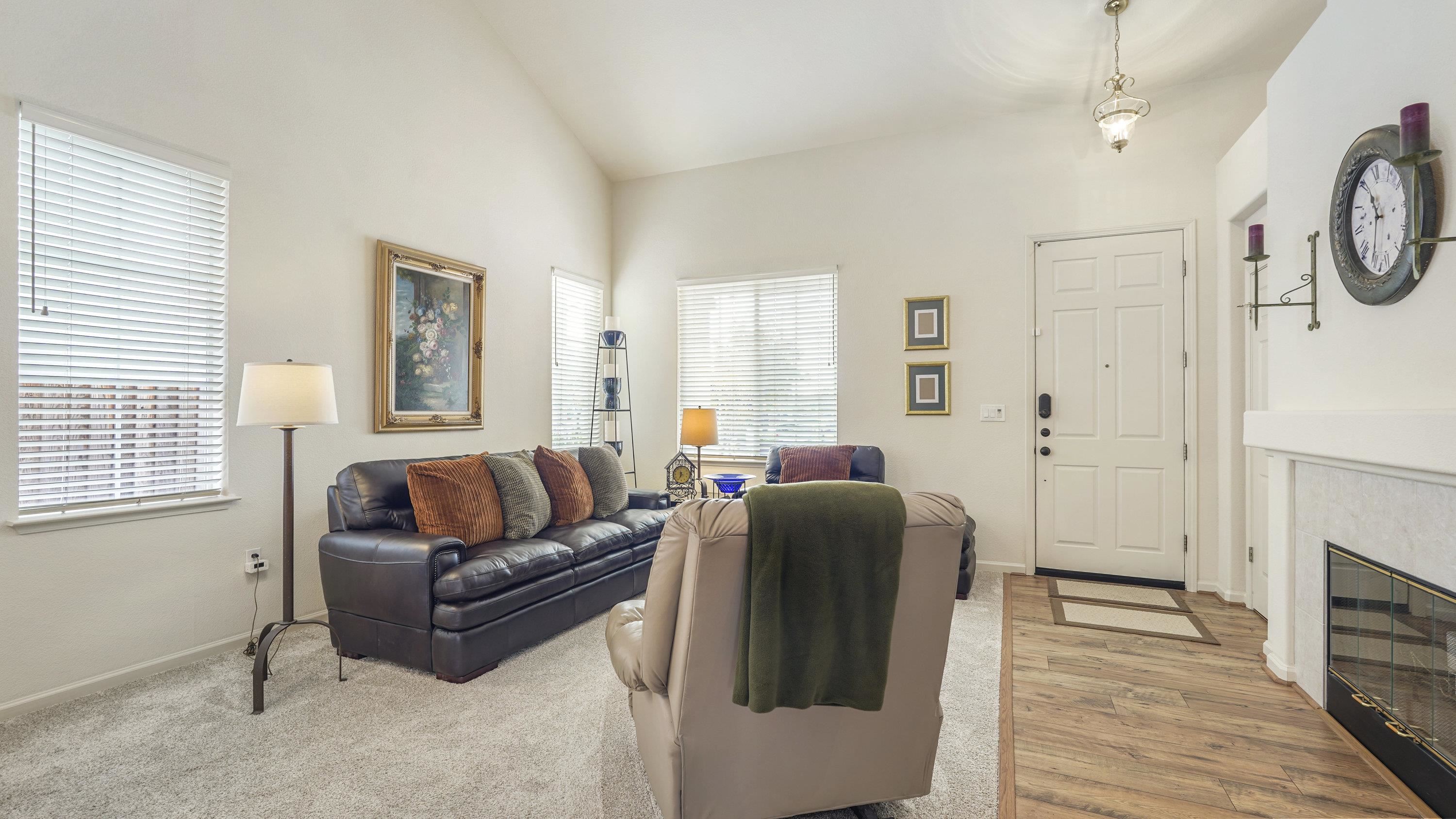 1388 Four Oaks Road San Jose, CA 95131 - Photo 6 of 47 a living room with furniture and a fireplace
