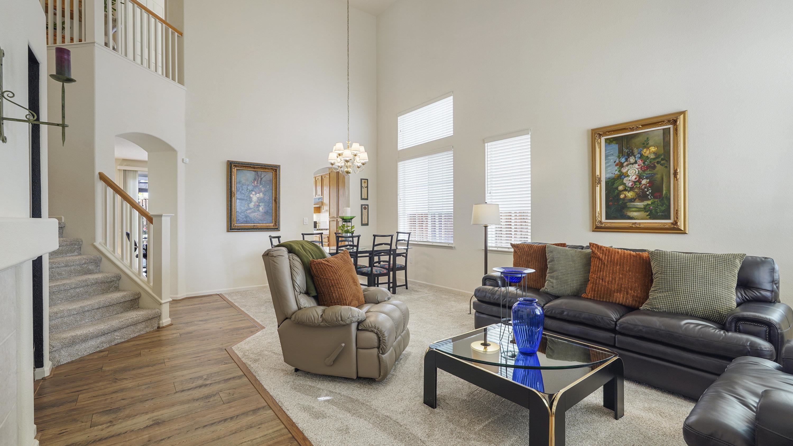1388 Four Oaks Road San Jose, CA 95131 - Photo 7 of 47 a living room with furniture and a wooden floor