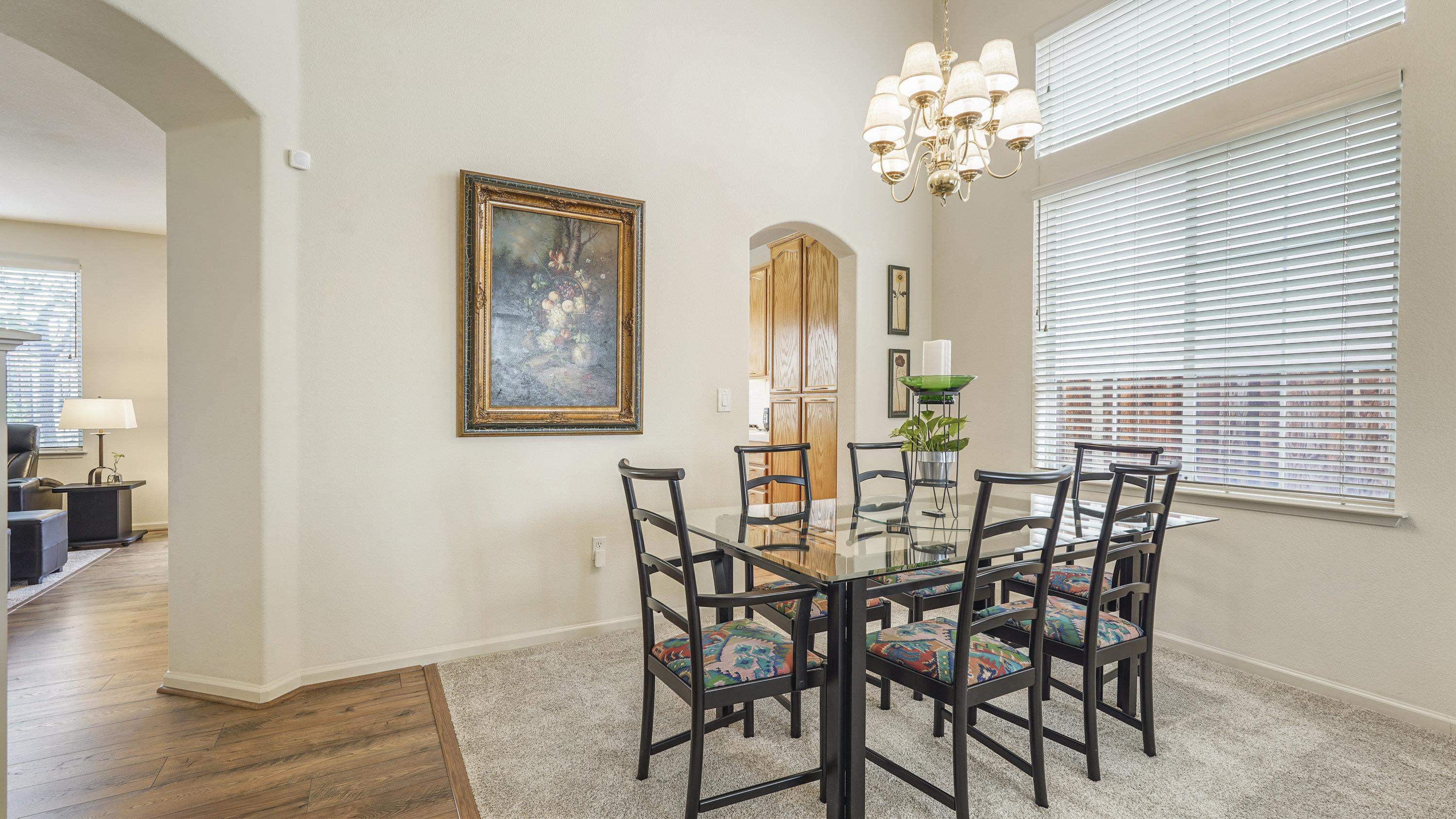 1388 Four Oaks Road San Jose, CA 95131 - Photo 10 of 47 a view of a dining room with furniture and chandelier
