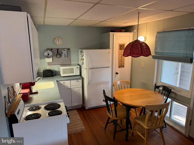 a room with furniture and a window