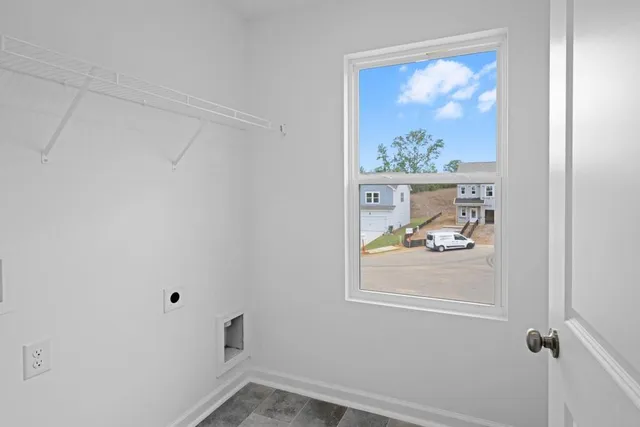 a aerial view of a house with pool garden and yard