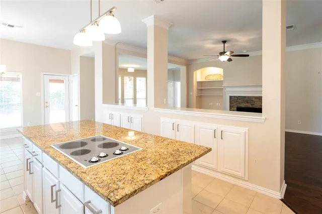 a bathroom with a sink vanity and mirror