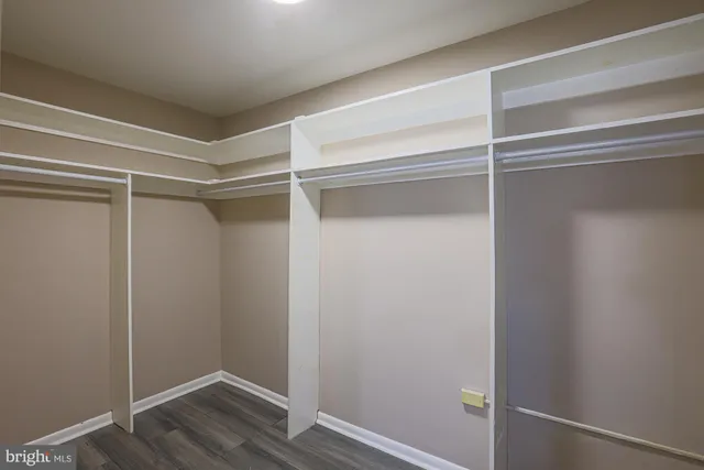 a view of an empty walk in closet