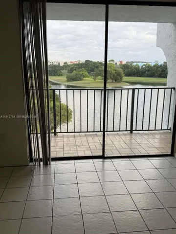 a bathroom with a toilet a sink and bathtub