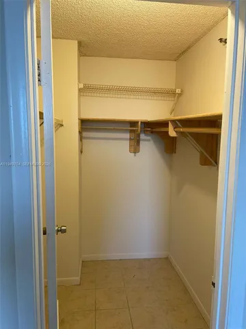 a view of a parked cars in front of a building