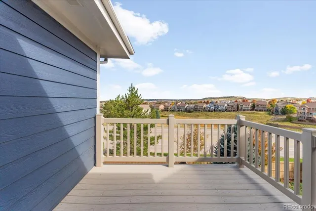 a view of a balcony with city view