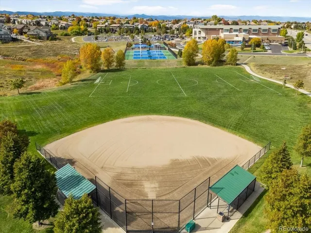 a view of a swimming pool with a lake view