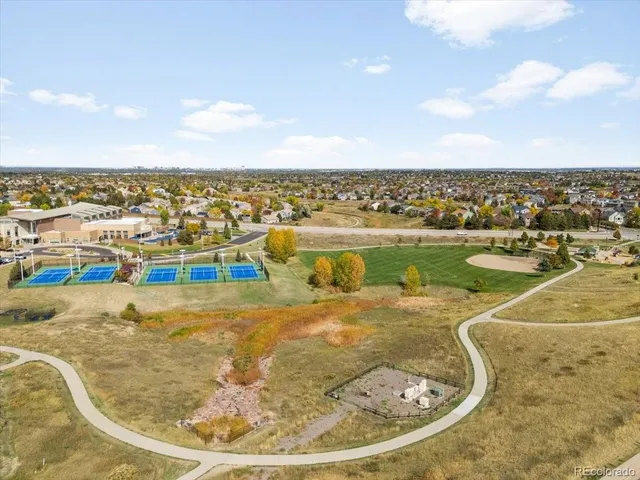 a view of a city with lawn chairs