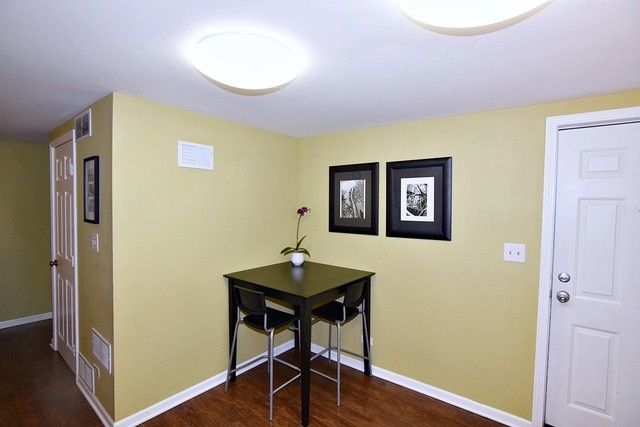 313 East State Street Geneva, IL 60134 - Photo 11 of 31 a workspace with furniture and wooden floor