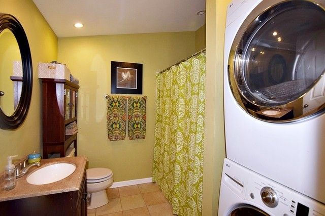 313 East State Street Geneva, IL 60134 - Photo 15 of 31 a bathroom with a toilet and a mirror