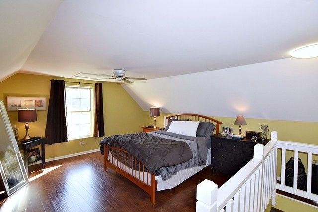 313 East State Street Geneva, IL 60134 - Photo 16 of 31 a bedroom with furniture and a window