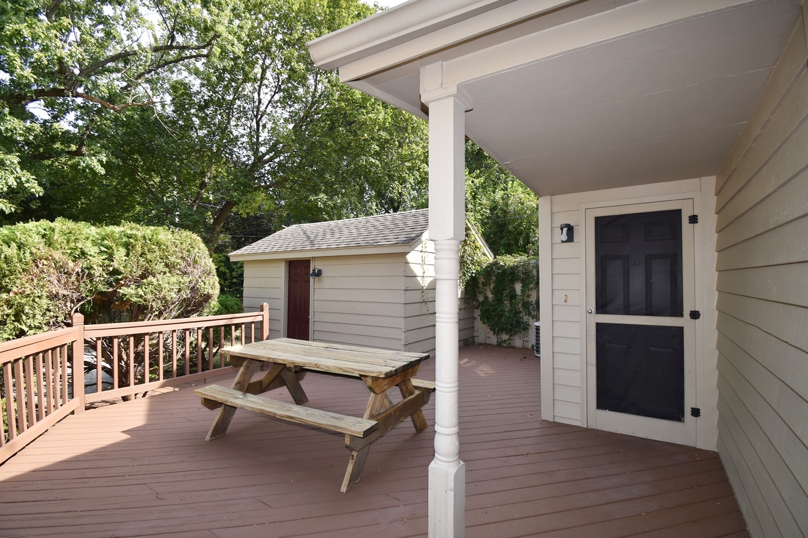 313 East State Street Geneva, IL 60134 - Photo 20 of 31 a view of a roof deck with wooden floor and fence