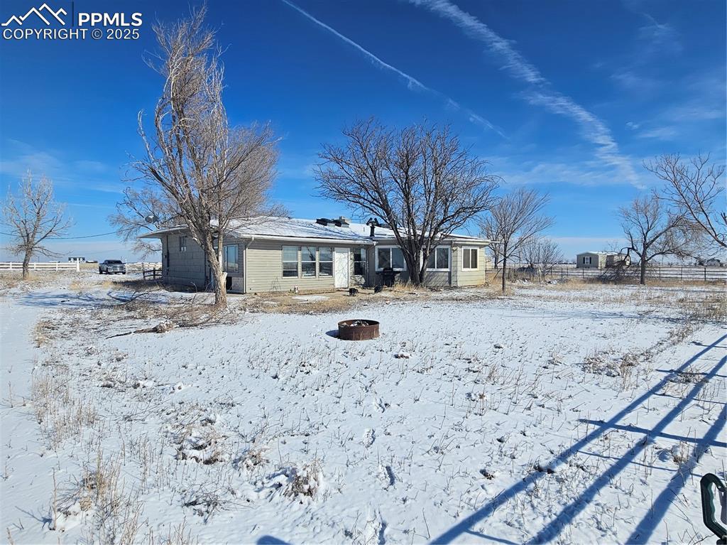 40444 Bush Road Avondale, CO 81022 - Photo 6 of 12 a street view with large trees