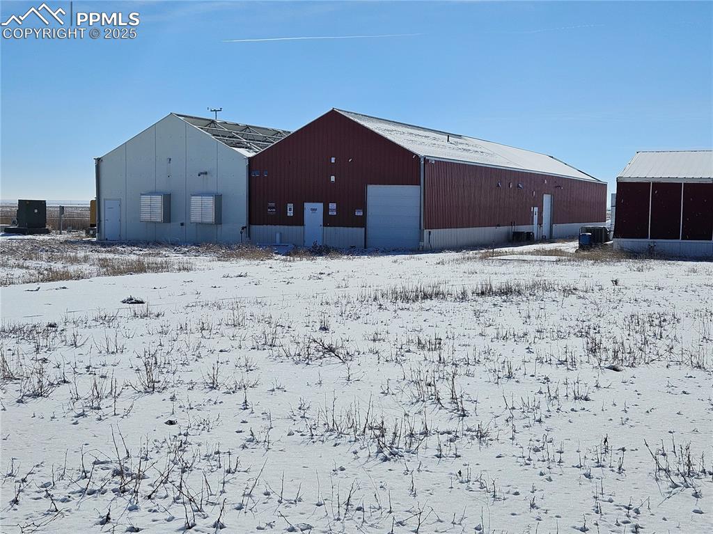 40444 Bush Road Avondale, CO 81022 - Photo 9 of 12 a front view of a house with a yard