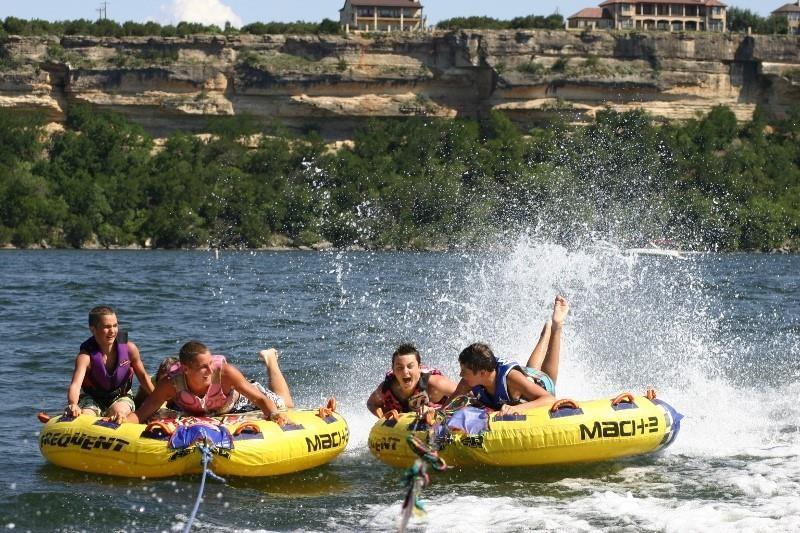 Tbd Lot #45 Tbd Ridge Graford, TX 76449 - Photo 20 of 30 a view of a lake with a chairs and fire pit