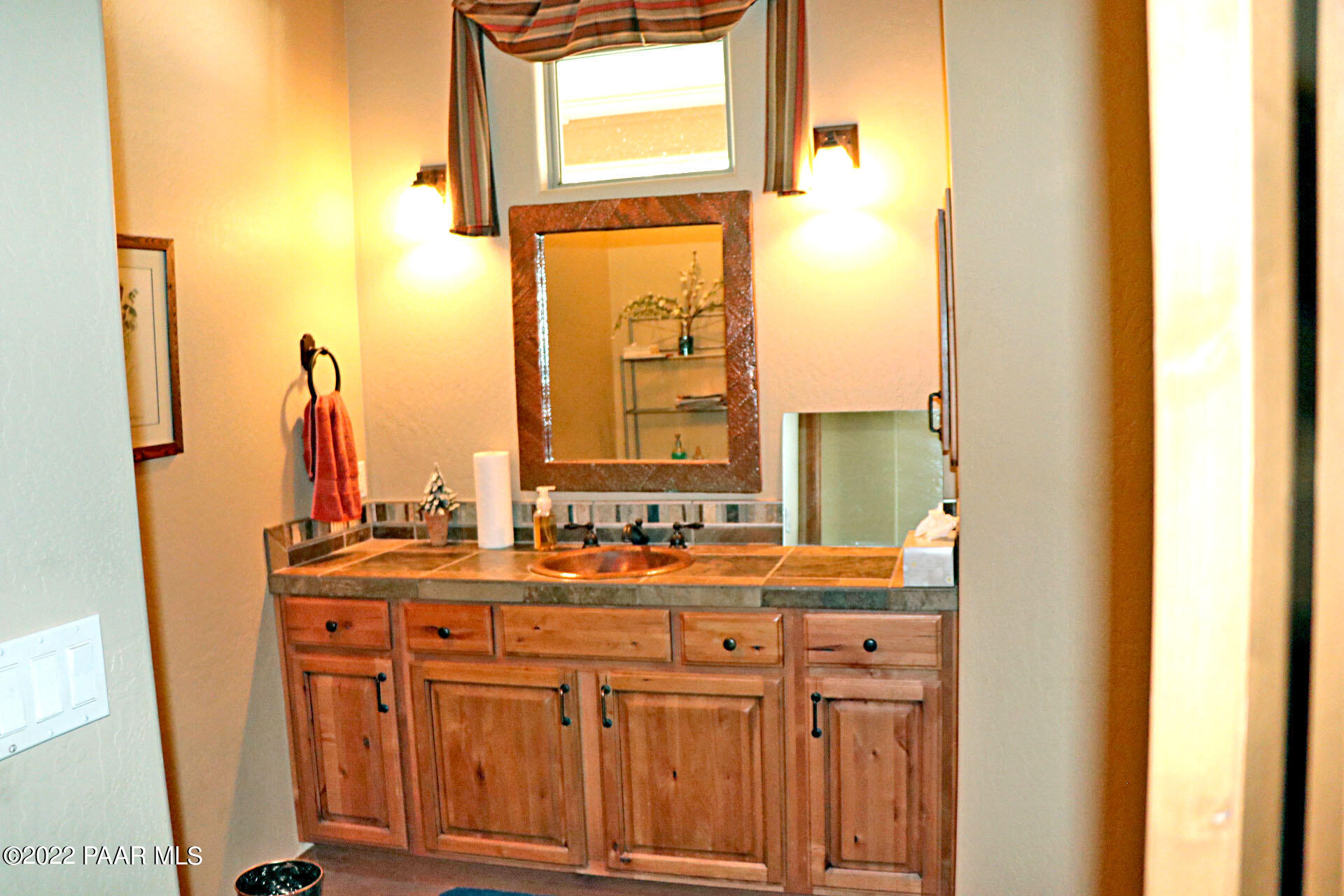 17001 Crossroads Ranch Road Prescott, AZ 86305 - Photo 43 of 54 a bathroom with a sink and a mirror
