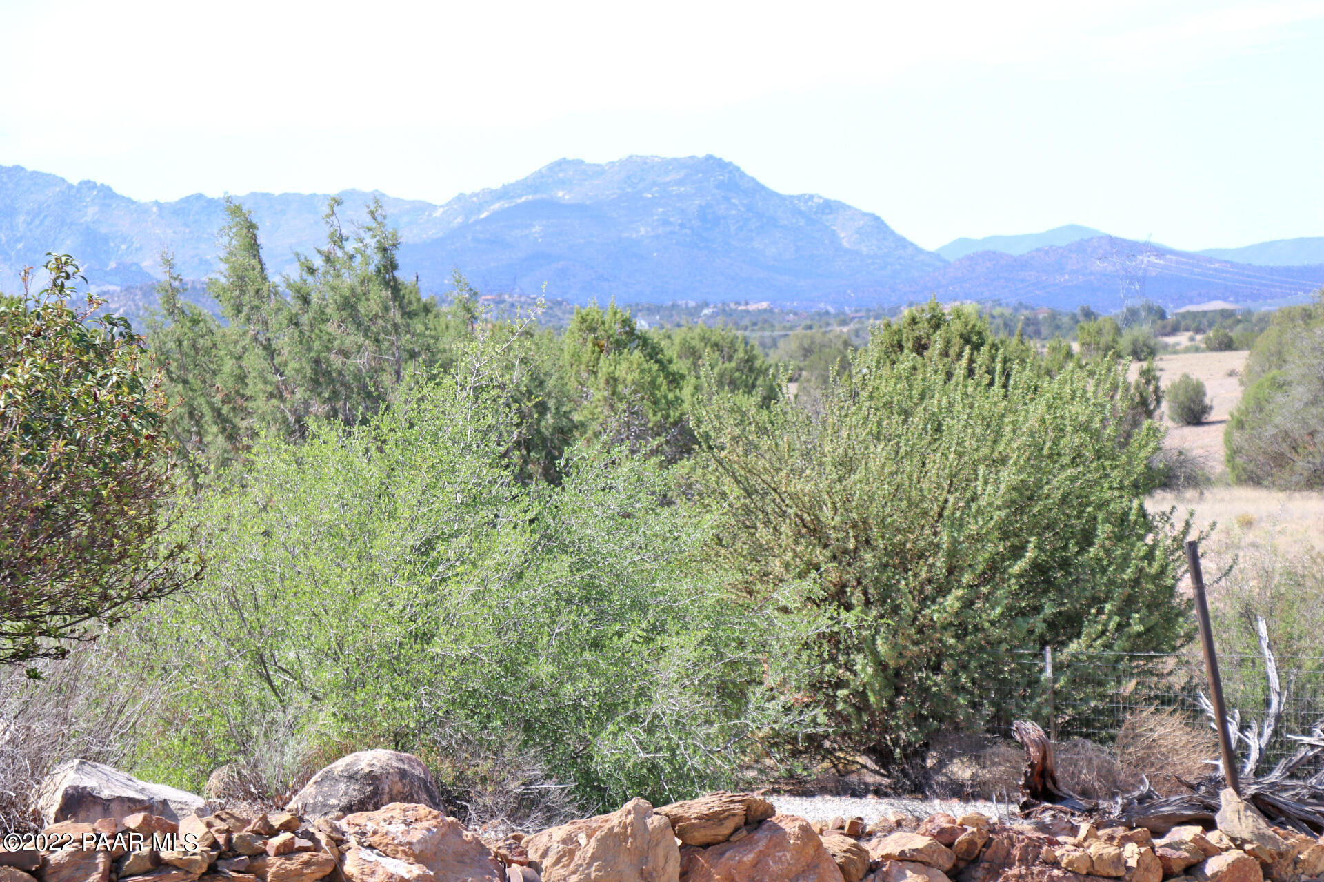17001 Crossroads Ranch Road Prescott, AZ 86305 - Photo 51 of 54 a view of a forest with mountains in the background