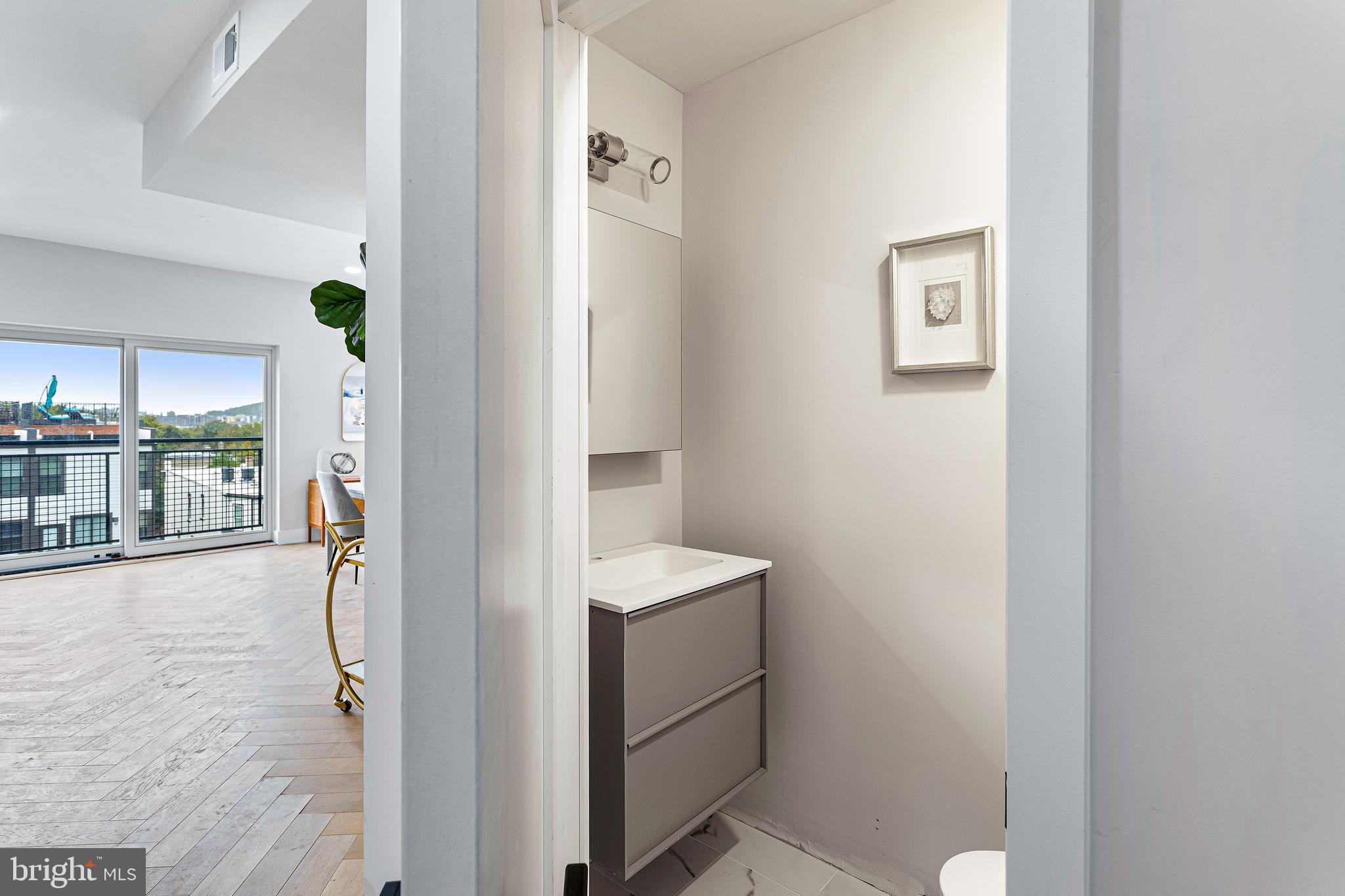 1516 East Capitol Street Northeast, Unit F Washington, DC 20003 - Photo 20 of 53 a view of walk in closet with window