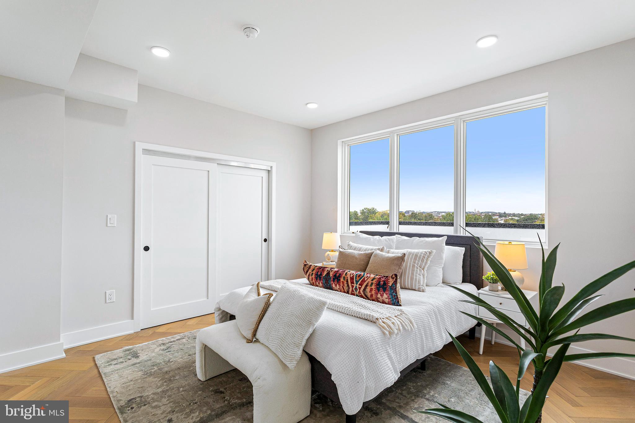 1516 East Capitol Street Northeast, Unit F Washington, DC 20003 - Photo 31 of 53 a bed room with a bed and a couch