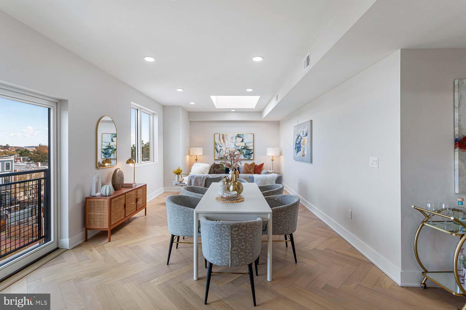 1516 East Capitol Street Northeast, Unit F Washington, DC 20003 - Photo 5 of 53 a dining room with furniture and wooden floor