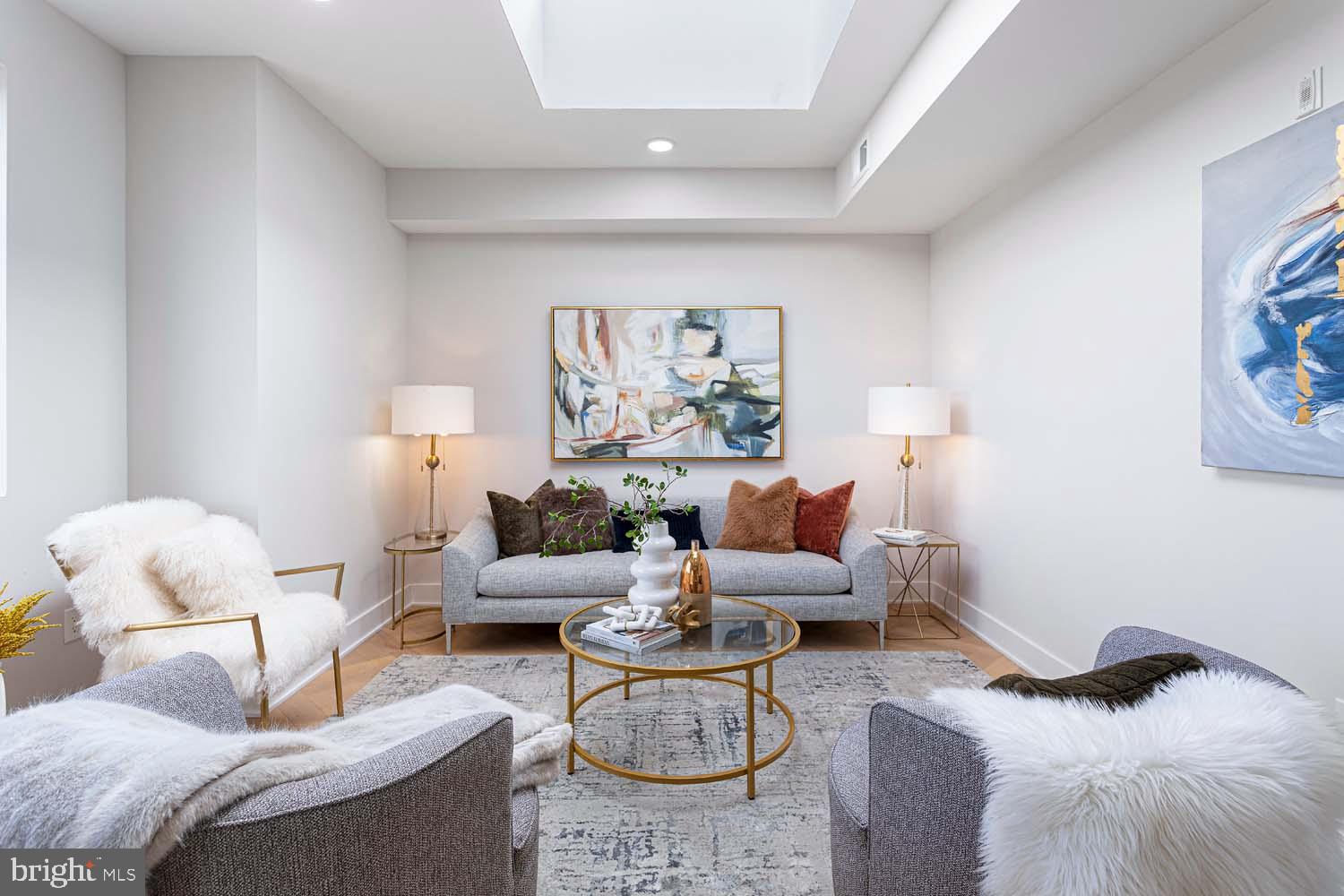 1516 East Capitol Street Northeast, Unit F Washington, DC 20003 - Photo 10 of 53 a living room with furniture and a painting