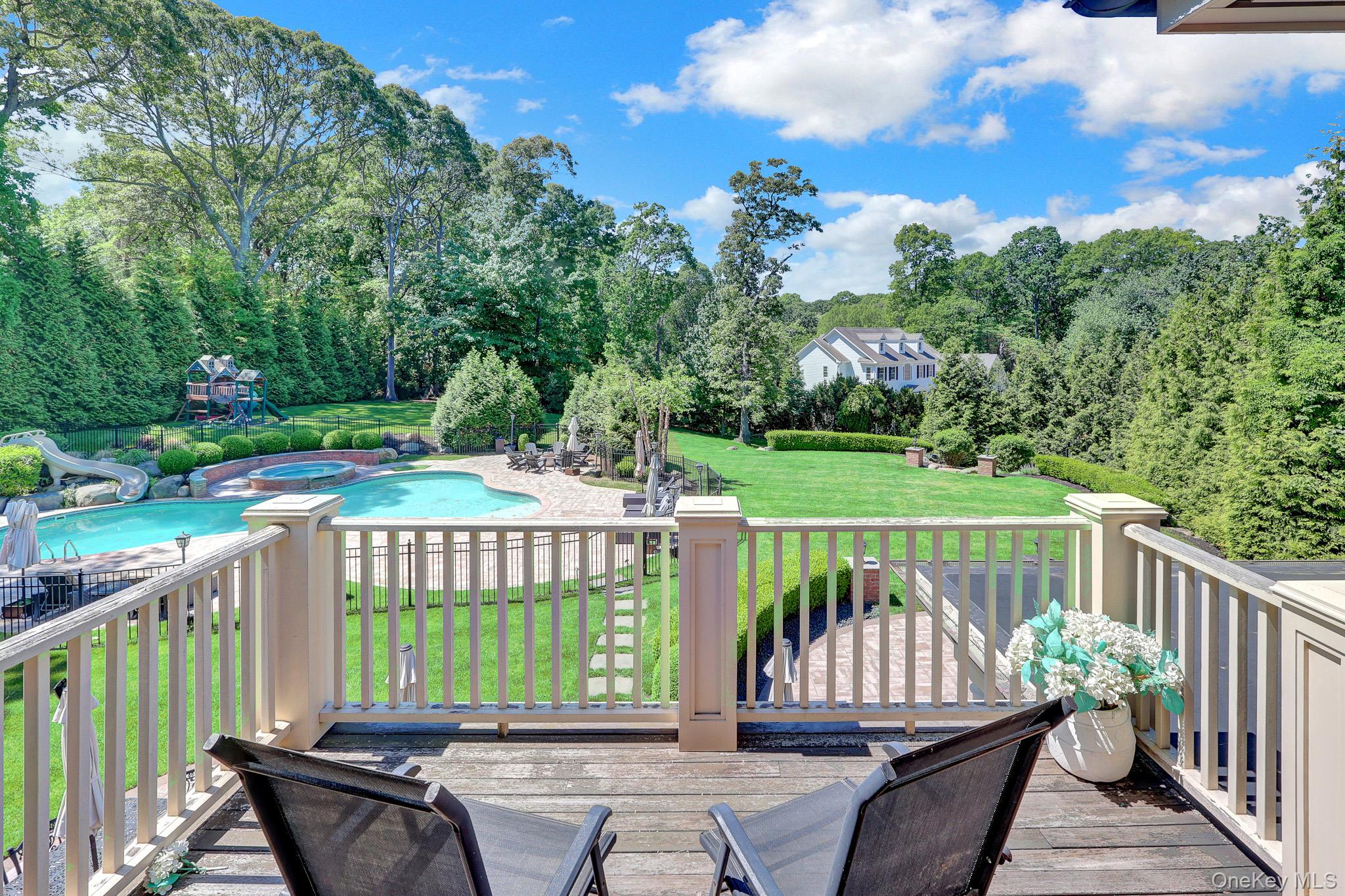 36 Old Field Road Setauket, NY 11733 - Photo 34 of 42 a view of a two chairs in the deck