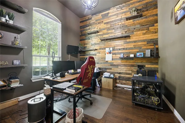 a workspace with furniture and a window