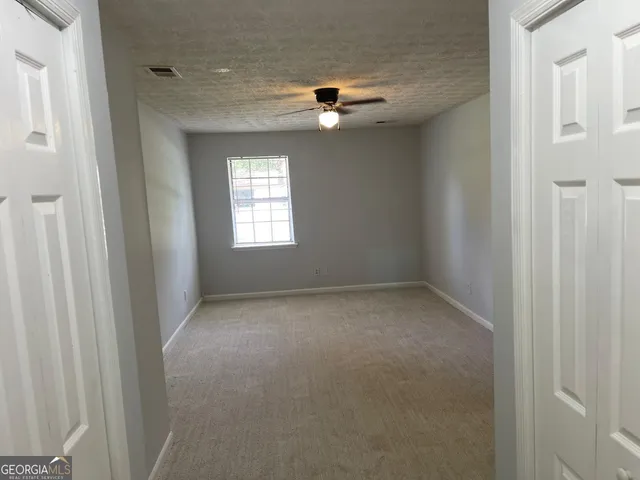 a view of empty room with window