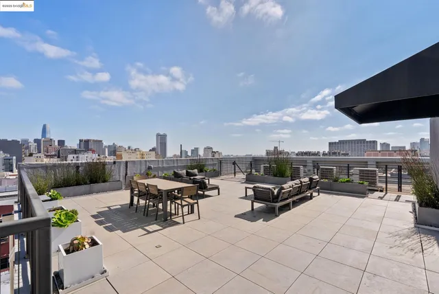 a view of a terrace with furniture