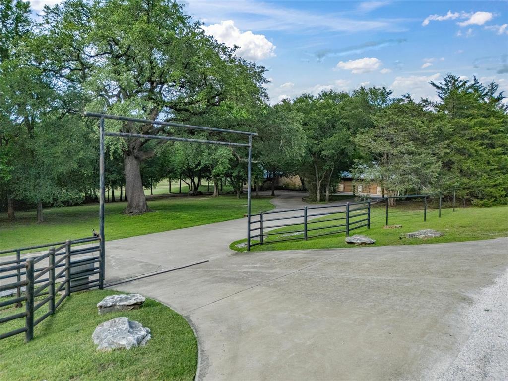 151 Trinity Bluffs Road Aledo, TX 76008 - Photo 34 of 40 a park view with a bench