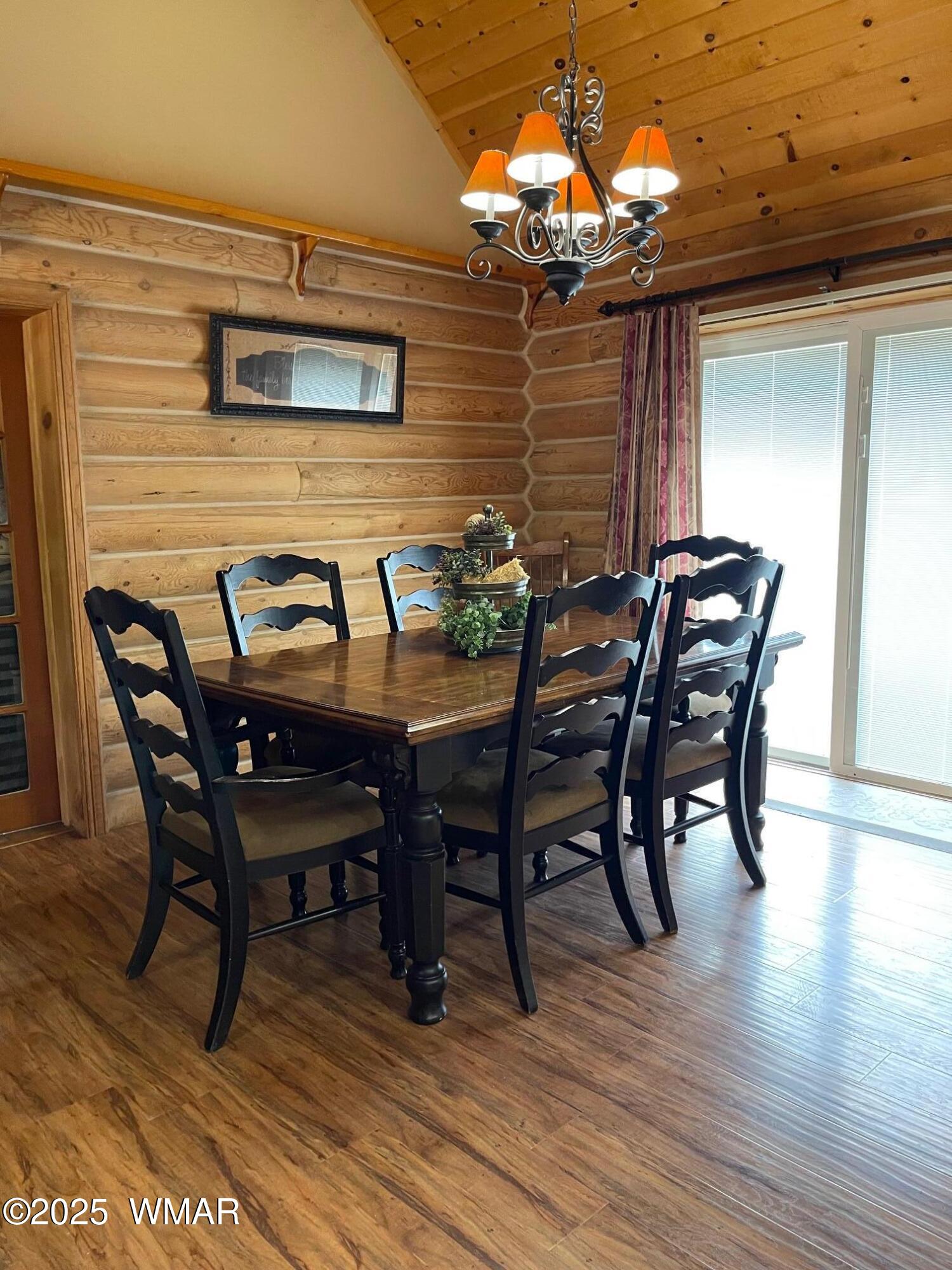 183 North Becker Lake Road Springerville, AZ 85938 - Photo 18 of 41 a view of a dinning table and chairs in the roof deck