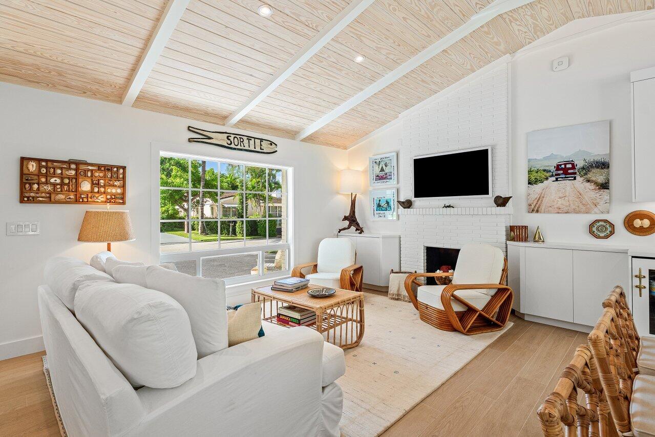 11 Hersey Drive Ocean Ridge, FL 33435 - Photo 2 of 32 Living Room with Decorative Fireplace