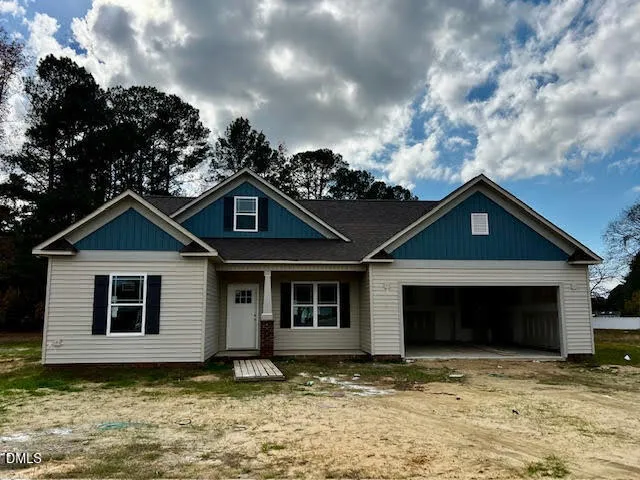 a house with trees in the background