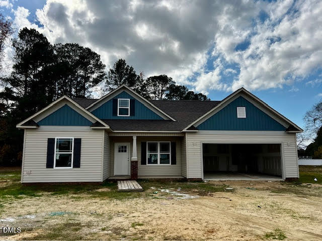 18 Alex Acres Way Selma, NC 27576 - Photo 1 of 5 a house with trees in the background