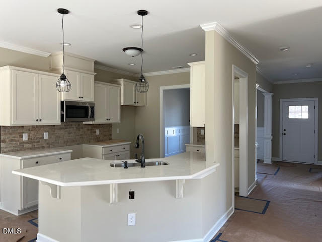 18 Alex Acres Way Selma, NC 27576 - Photo 4 of 13 a kitchen with stainless steel appliances kitchen island granite countertop a sink a center island a refrigerator and a view of living room