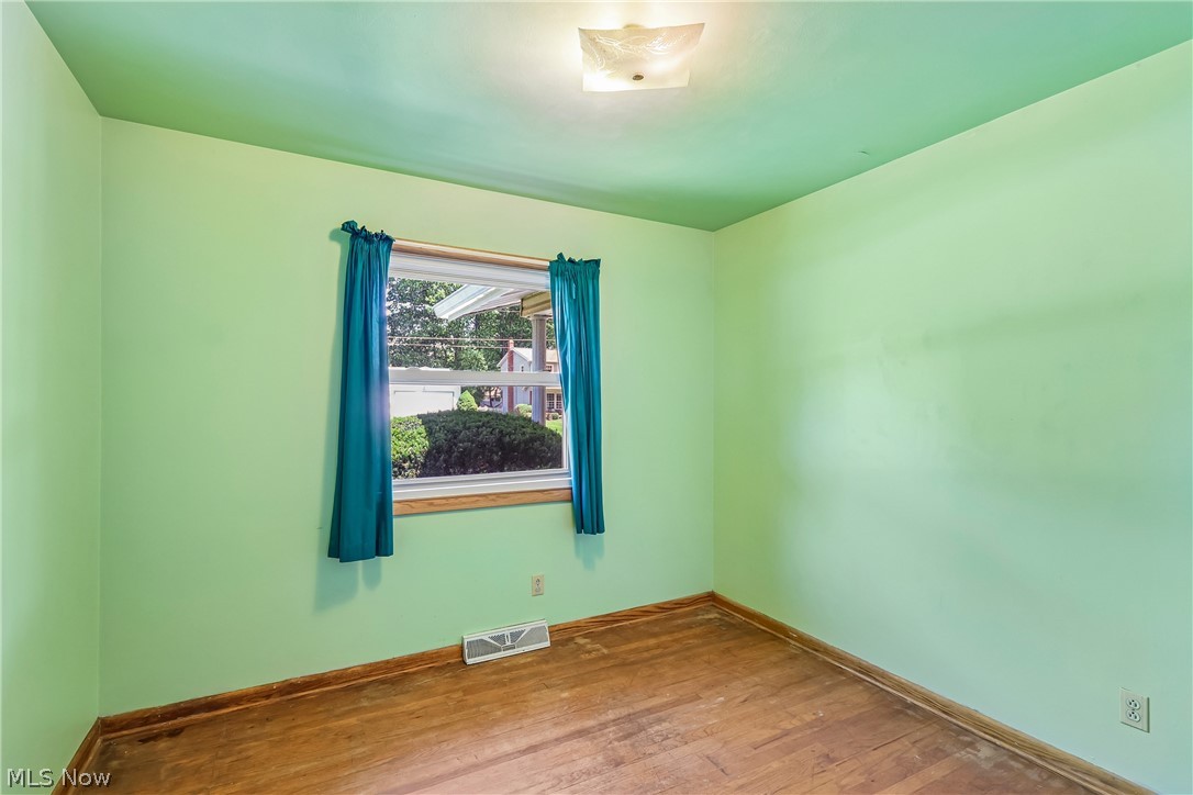 2758 Shellhart Road Norton, OH 44203 - Photo 20 of 41 Bedroom with wood floor